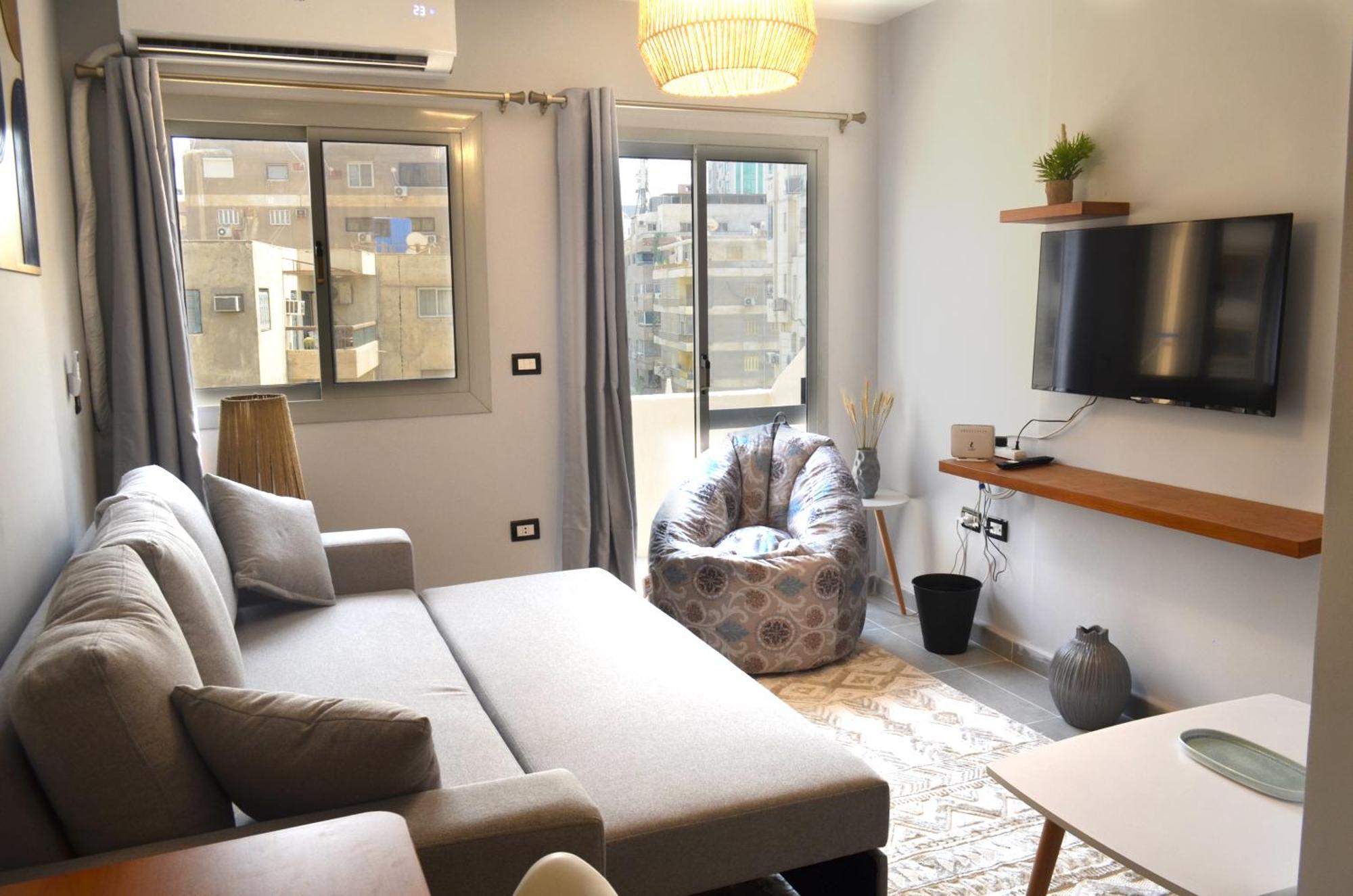 Sunny Haven 1br Near Airport Apartment Kairo