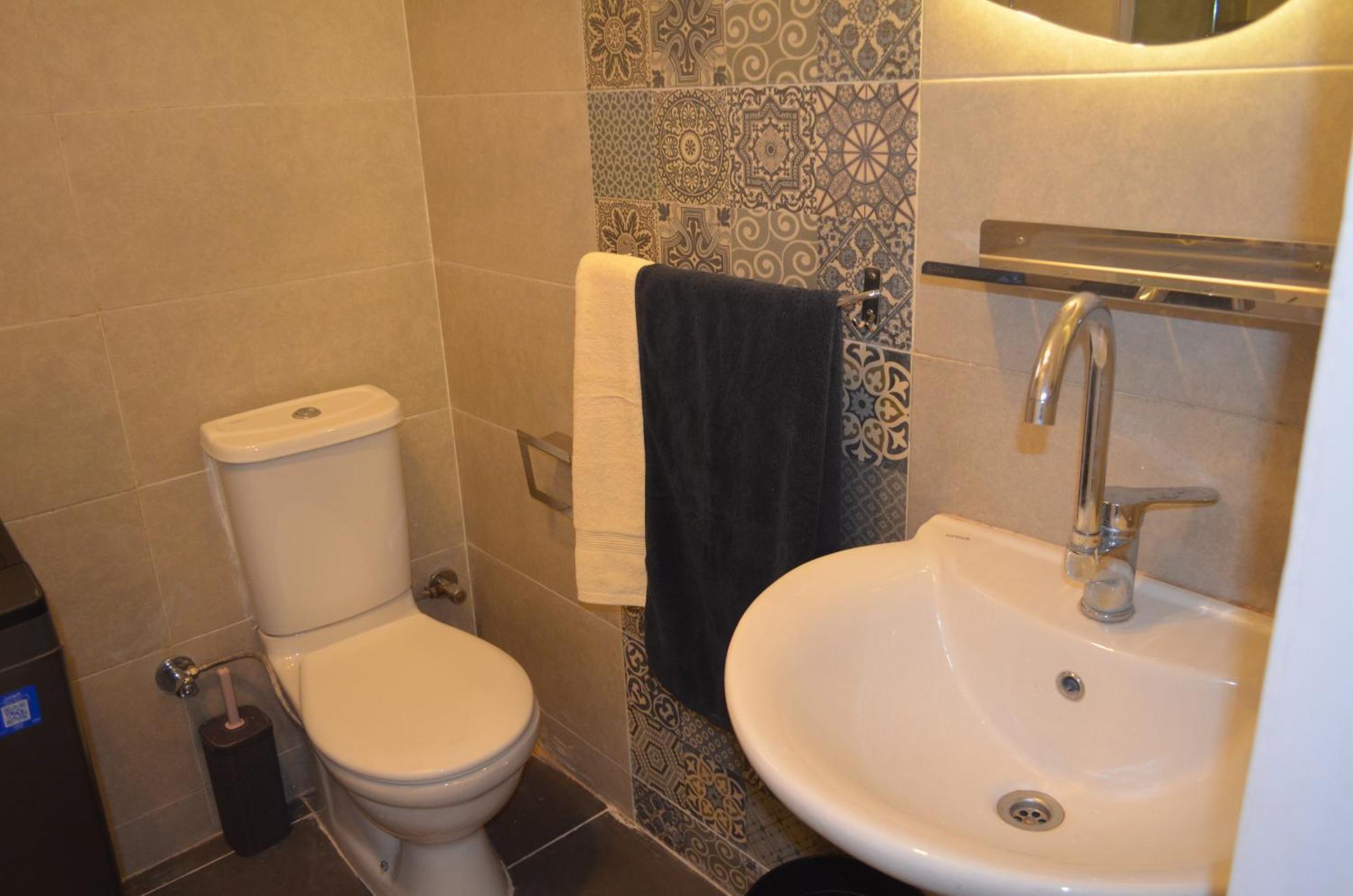 Sunny Haven 1br Near Airport Kairo